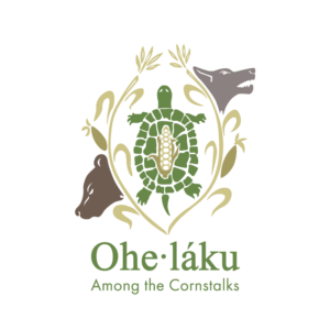 Ohelaku-Logo Ohe·láku Among the Cornstalks